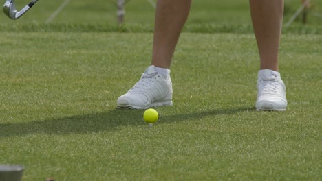 woman playing golf