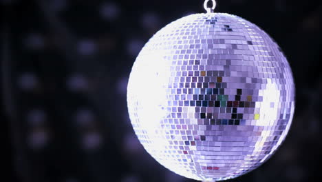 shiny disco ball spinning around