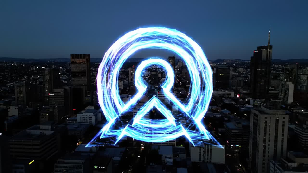 A Stunning Visual Transformation: An Urban Landscape Illuminated by a High-Tech, Electric Logo Displaying Vibrant Energy and Modern Innovation