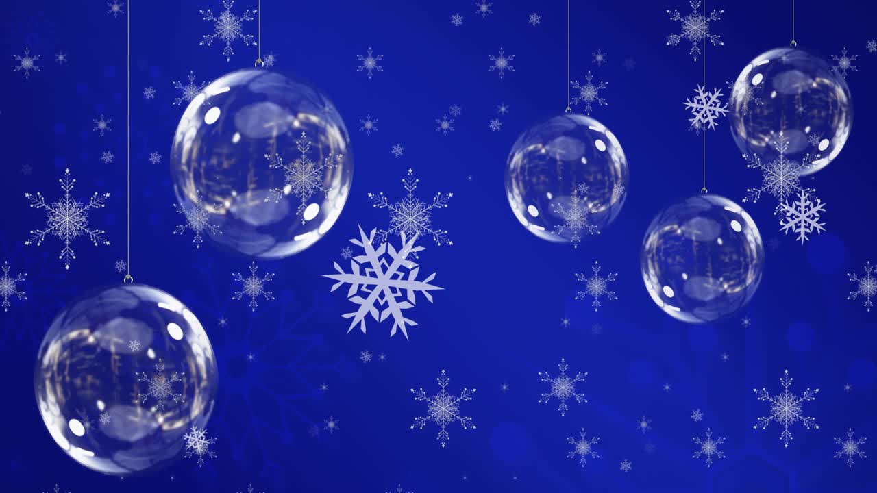 animación de bolas de navidad sobre copos de nieve sobre fondo azul