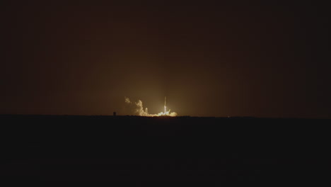 a shuttle is launched in the night