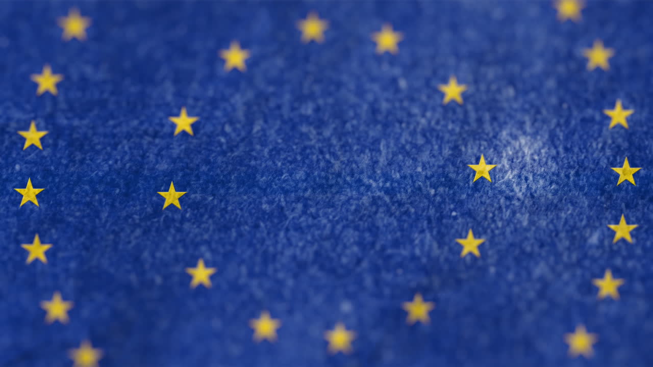 Animation of two circles of yellow stars on blue and textural background