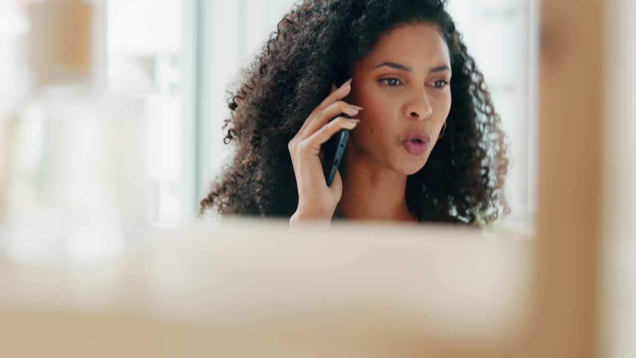 Woman on phone call in office