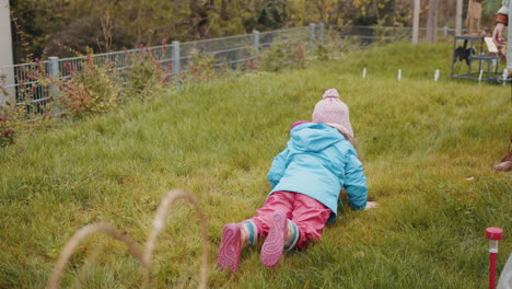 mother and daughter playing in the garden