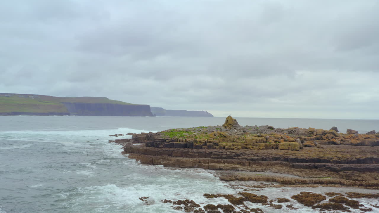 Static shot of the Cliffs of Moher from Doolin, with Crab Island in the foreground. County Clare, Ireland