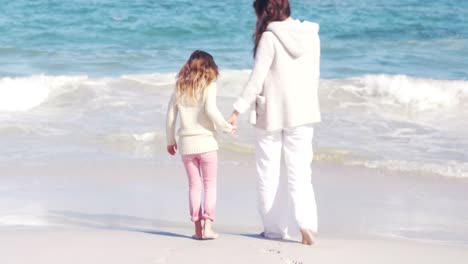 Mother-and-daughter-holding-hands