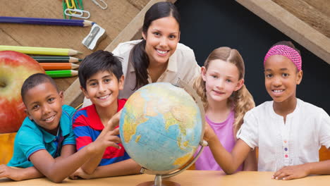 animation of smiling biracial female teacher and diverse schoolchildren with globe over board