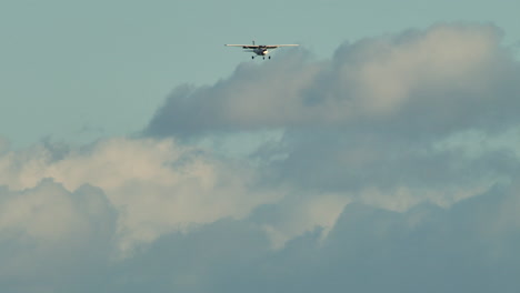 Cessna-172-Plane-Flying-Against-Cloudy-Sky-Background-In-Canada