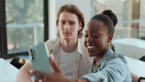 friends taking a selfie in a classroom