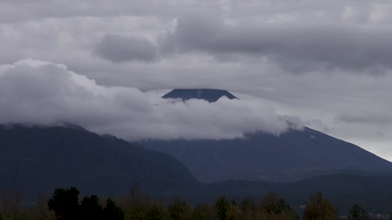 Villarrica Volcano, Pucon, Chile - April 04, 2017. Clouds over Villarrica Volcano in Pucon, Chile