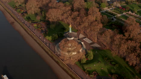 Pan-up-reveal-aerial-shot-of-London-skyline-from-Battersea-pagoda