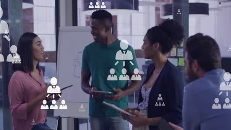 animation of networking icons and data processing over diverse business people