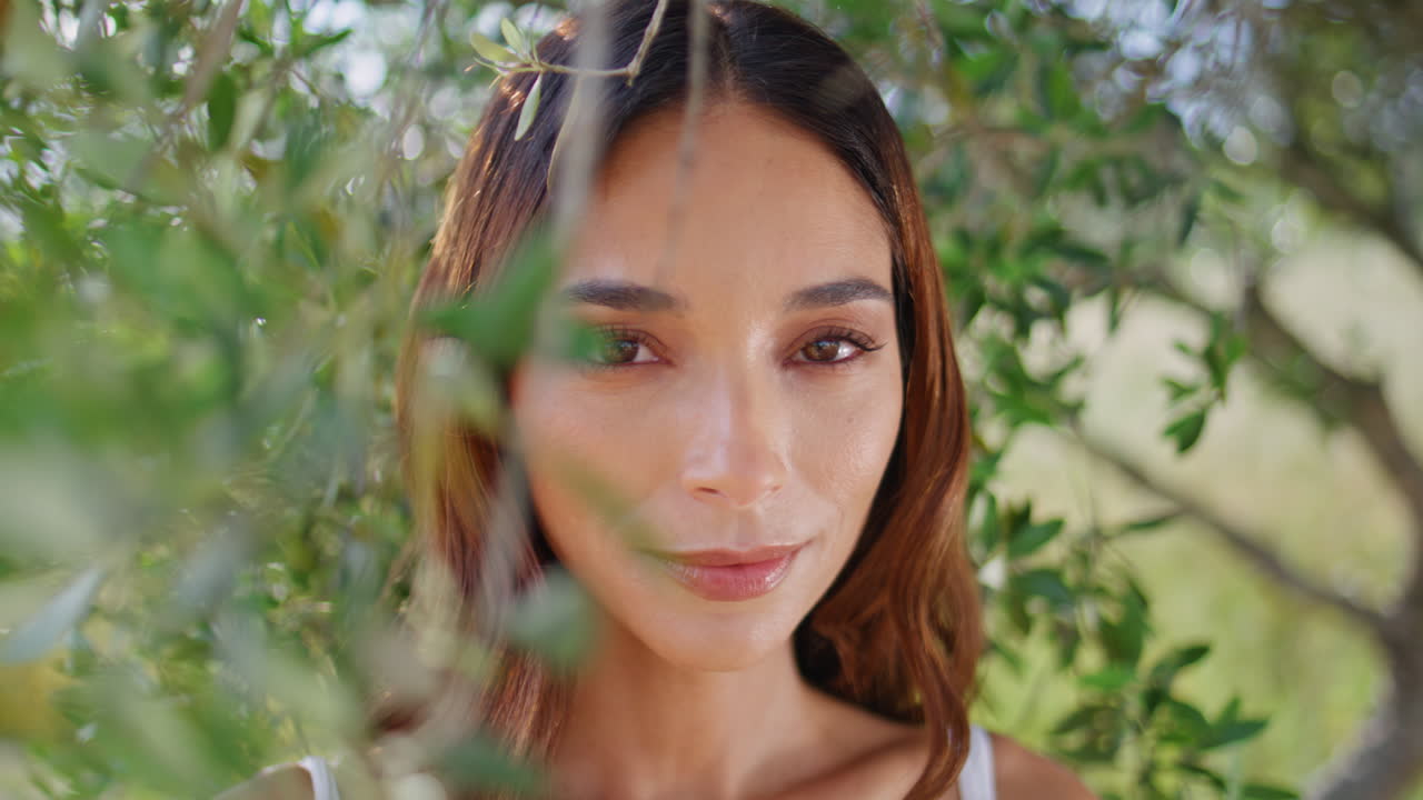 Serene woman rest garden smiling with confidence closeup. lady posing