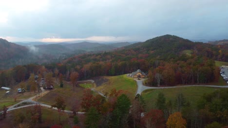 an orbiting drone shot of a barn in sunset, south carolina