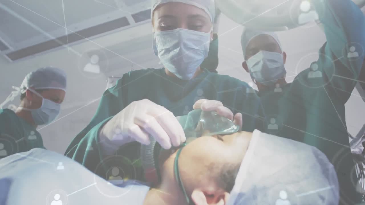 수술실에서 외과의사에 대한 사람 아이콘과의 연결 네트워크의 애니메이션