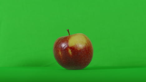 fresh apple spinning on green screen background. healthy plant vegan vegetarian food footage ready to key. prores 4k.