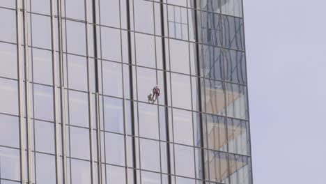 window cleaners on high-rise building