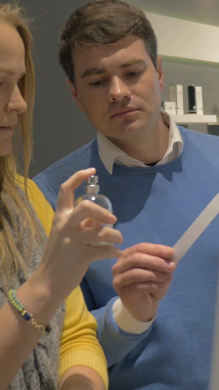 People smelling perfume