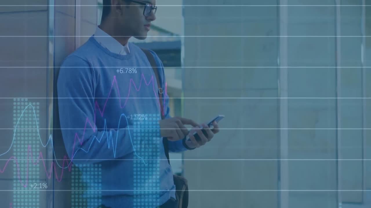 Animation of statistical data processing against biracial man using smartphone at office
