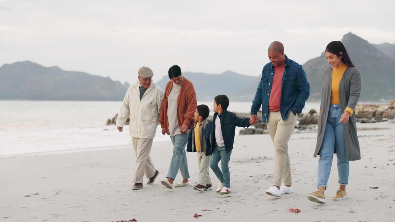 Beach, travel and big family holding hands
