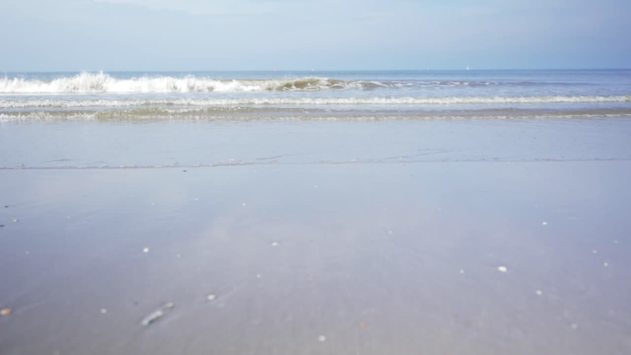 Small waves on the beach, low angle