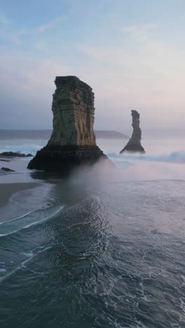 Coastal Rock Formations in Misty Sunrise/Sunset