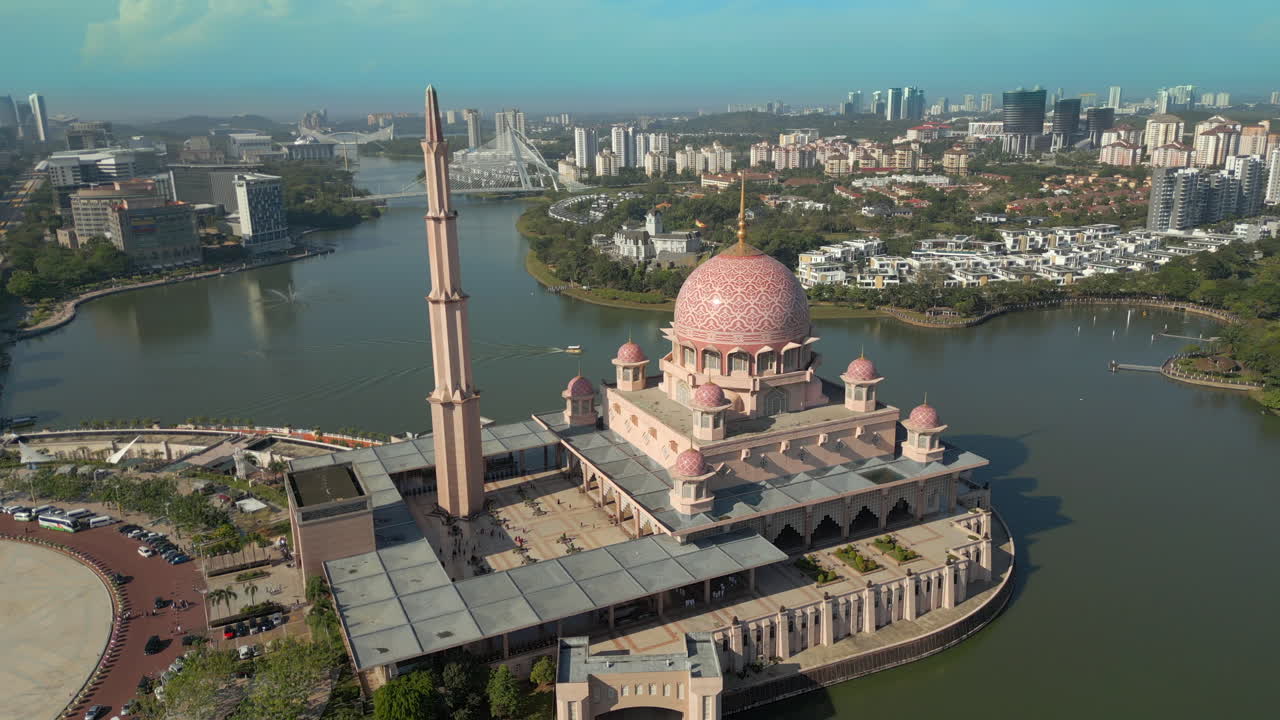 Small Tourist Boat Travels Around Putra Mosque Monolith Kuala Lumpur Malaysia Drone Rotate South 4K 60FPS