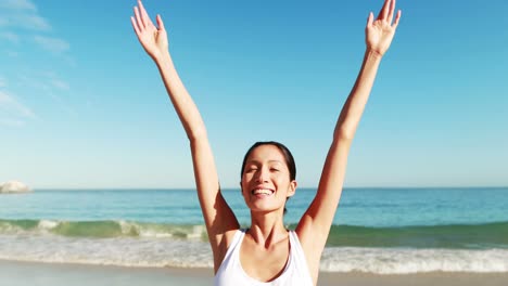 Woman-standing-with-arms-outstretched