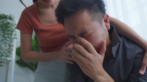 woman comforting a crying man