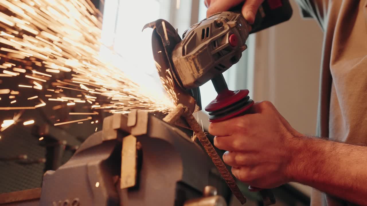 Close up of metal grinding with sparks flying during intense cutting process