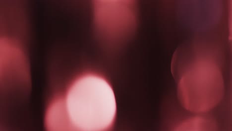 Video-of-flickering-pink-bokeh-spots-of-light-with-copy-space