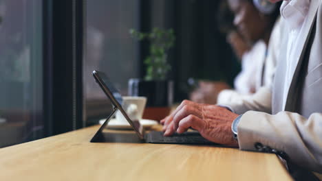 Cafe,-tablet-and-business-person-hands-typing