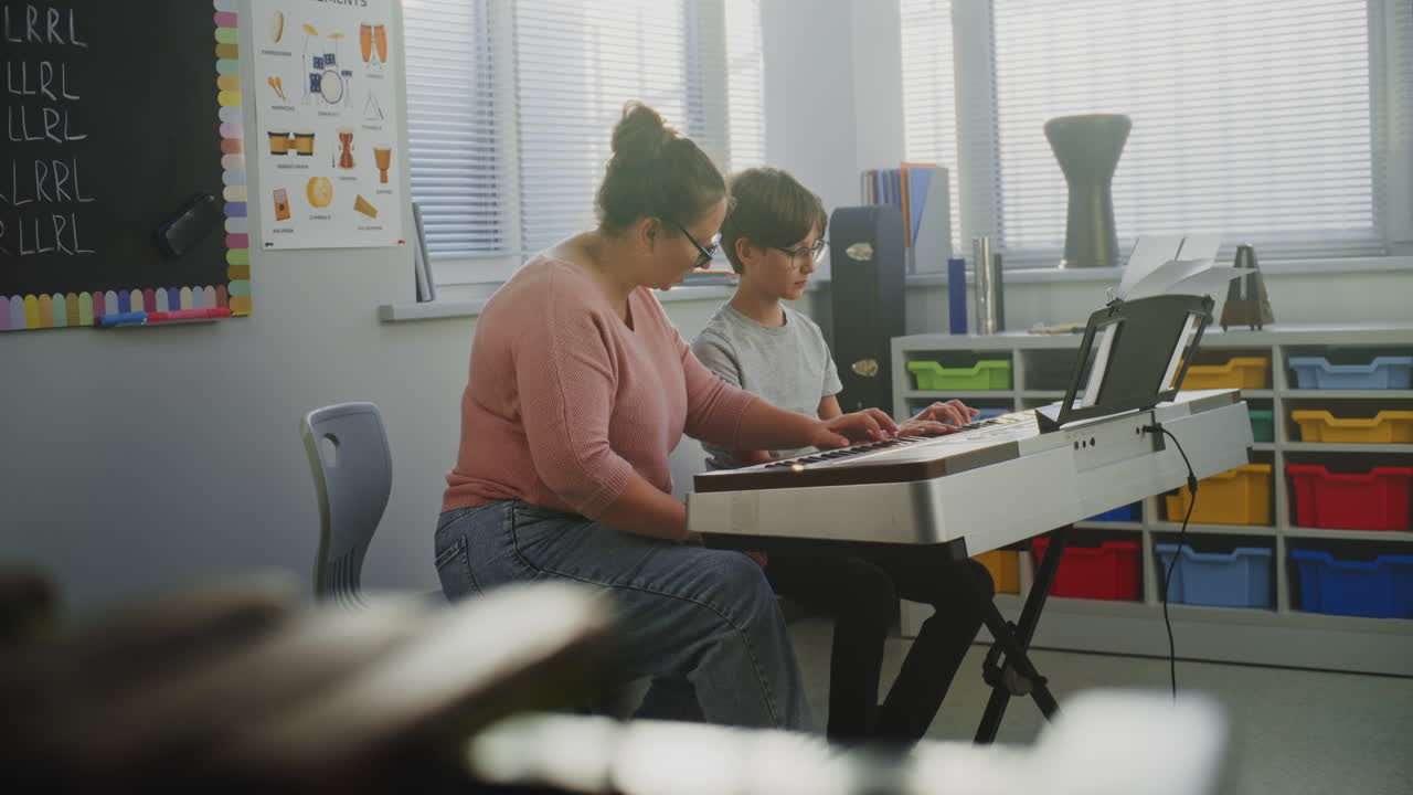 Talented Boy Playing Piano During Music Lesson Rehearsing Before Musical Performance