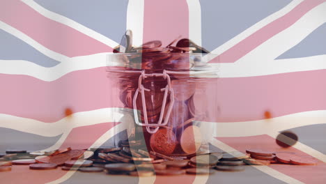 animación de un frasco con monedas sobre la bandera de reino unido