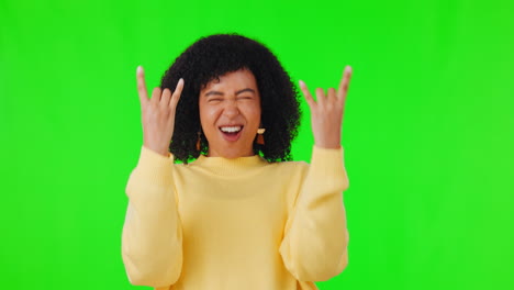 rock, música y gesto de la mano con la mujer en verde
