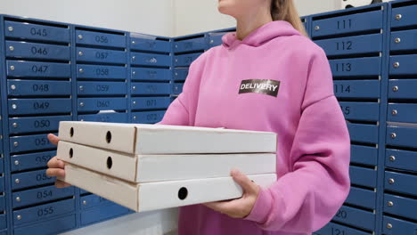 Delivery-woman-holding-carton-boxes