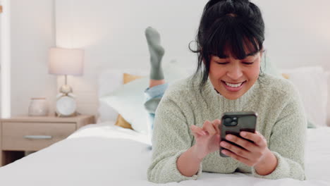 Relax,-bed-and-social-media-woman-on-smartphone