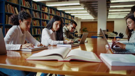 students studying in a library