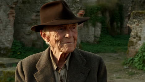 portrait of an elderly man in a hat
