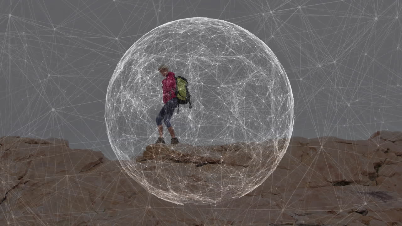 Female hiker balancing on rocky ledge, floating inside animated technology wireframe sphere