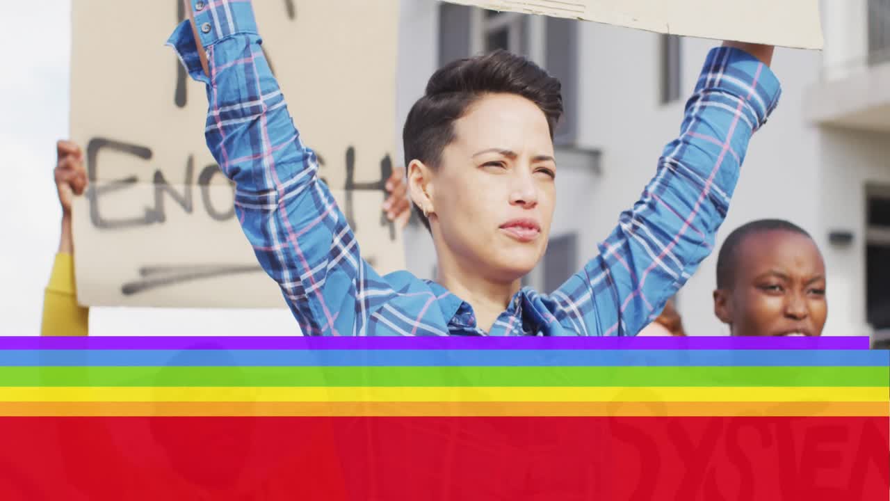 Animation of rainbow flag over caucasian female protester