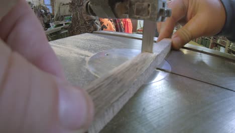 Using-a-bandsaw-to-cut-a-narrow-strip-of-wood