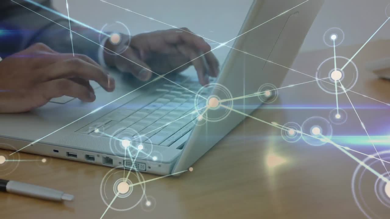 animación de una red de conexiones a través de un hombre de negocios biracial usando una computadora portátil