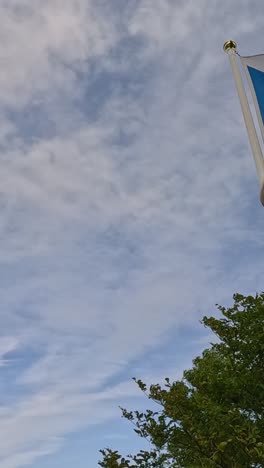 scottish flag waving over stirling landscape