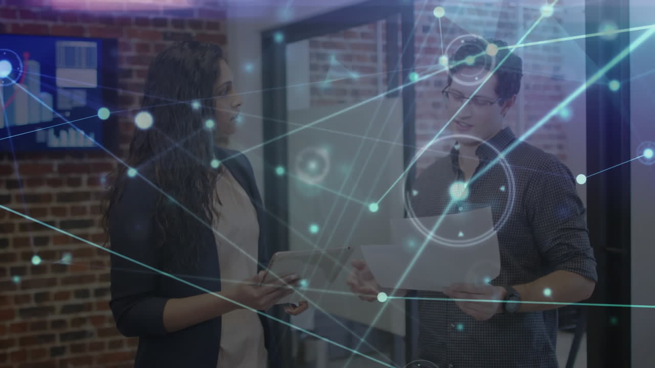 Animation of communication network over male and female colleague talking in office