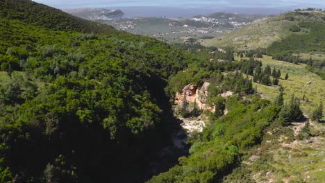 erosion canyon in mountain forest landscape at llogara national park, albanian ionian sea coast