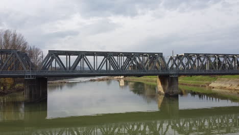 drone flies towards a bridge over the arno river