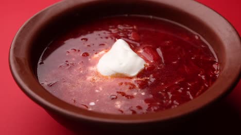 bowl of borscht with sour cream