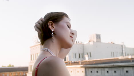 close-up view of elegant brunette woman with earrings