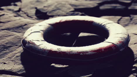 very old abandoned grungy lifebuoy